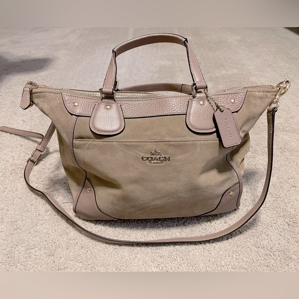Tan coach purse with cross body strap